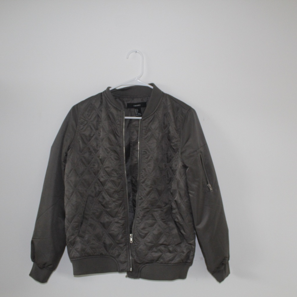 silvery-green bomber jacket